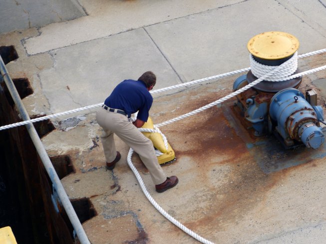 Untying the mooring ropes